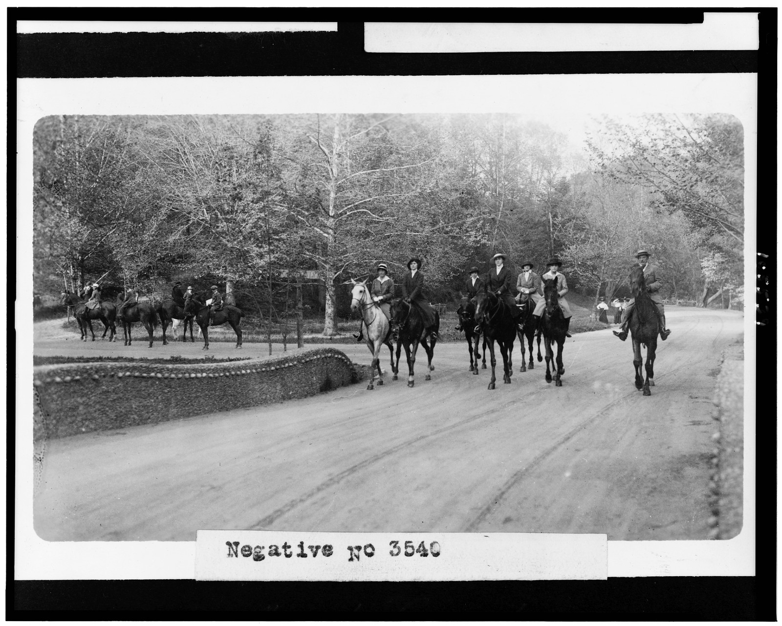 [Horseback riders on road in Rock Creek Park, Washington, D.C.], [between 1909 and 1932] — historic photograph