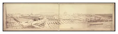 Panoramic view of fair grounds with domed building and railway tracks