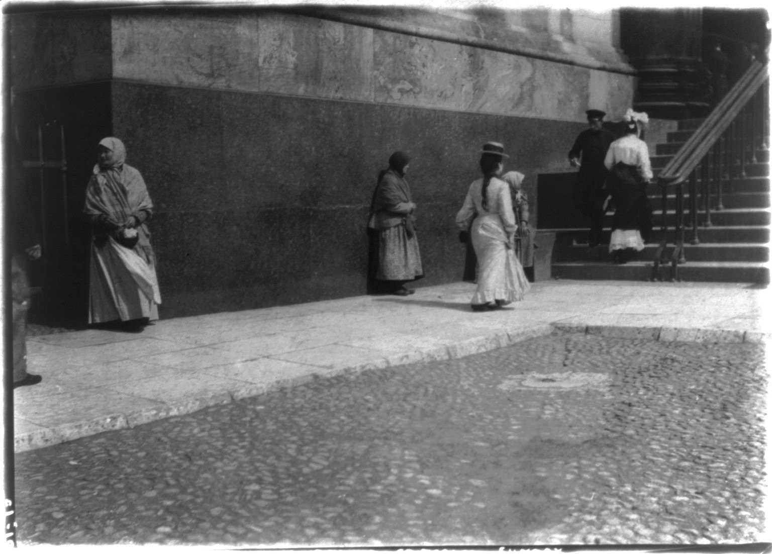 Beggars before St. Isaac's, [between 1902 and 1917] — historic photograph