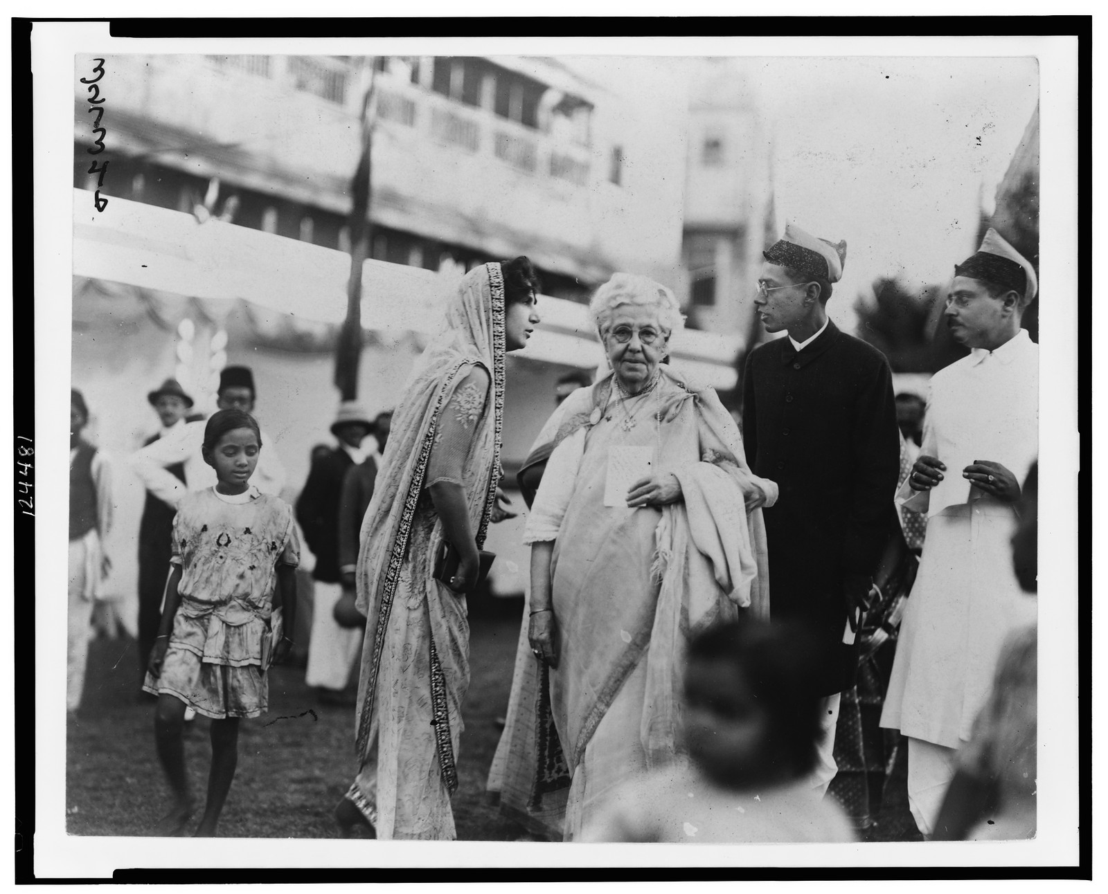 [Annie Wood Besant, dressed in a sari, on a street in India] — historic photograph