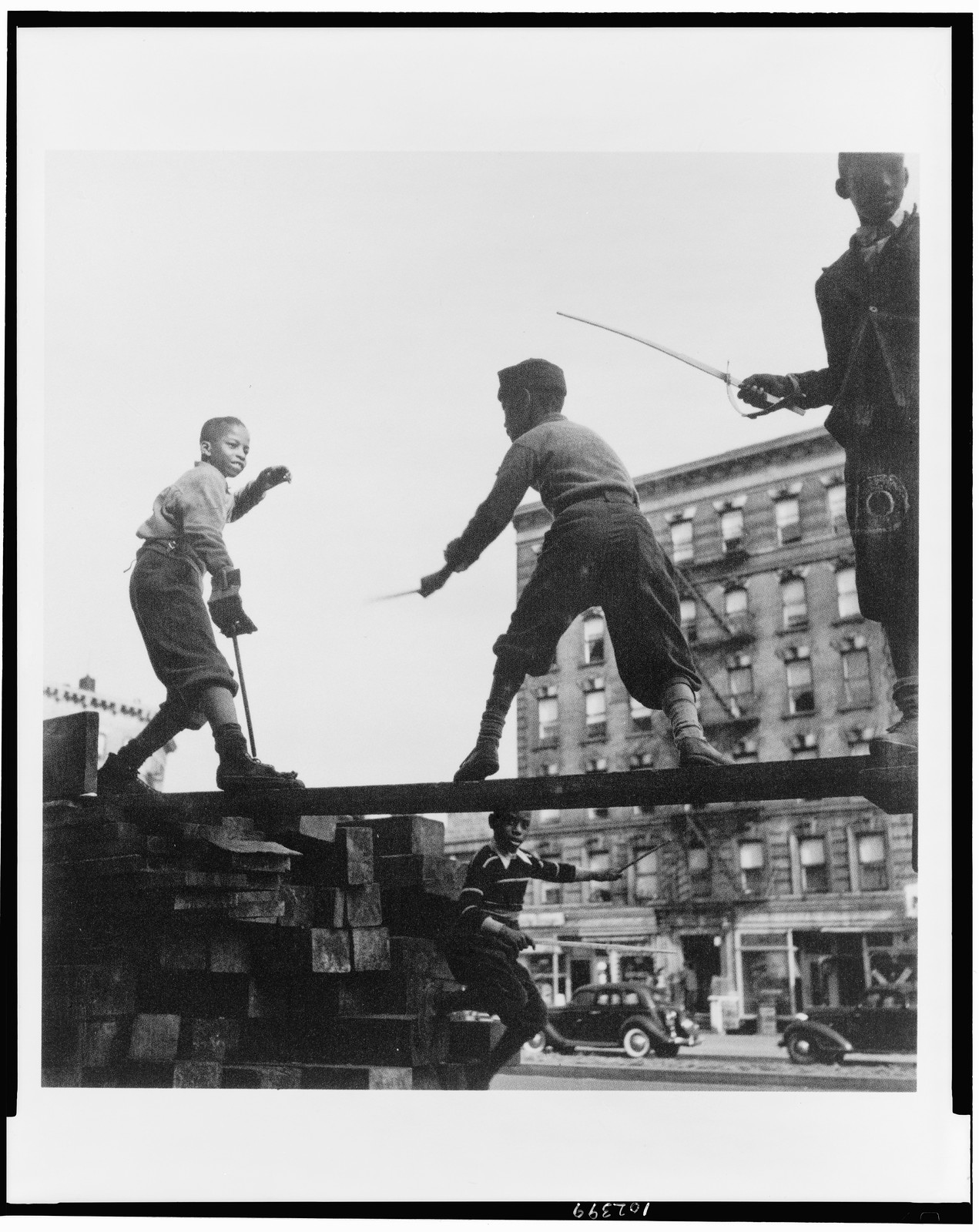 [Four boys, three of them on beam of ruins(?) of building, playing with toy swords, Harlem, New York], [between 1932 and 1940] — historic print