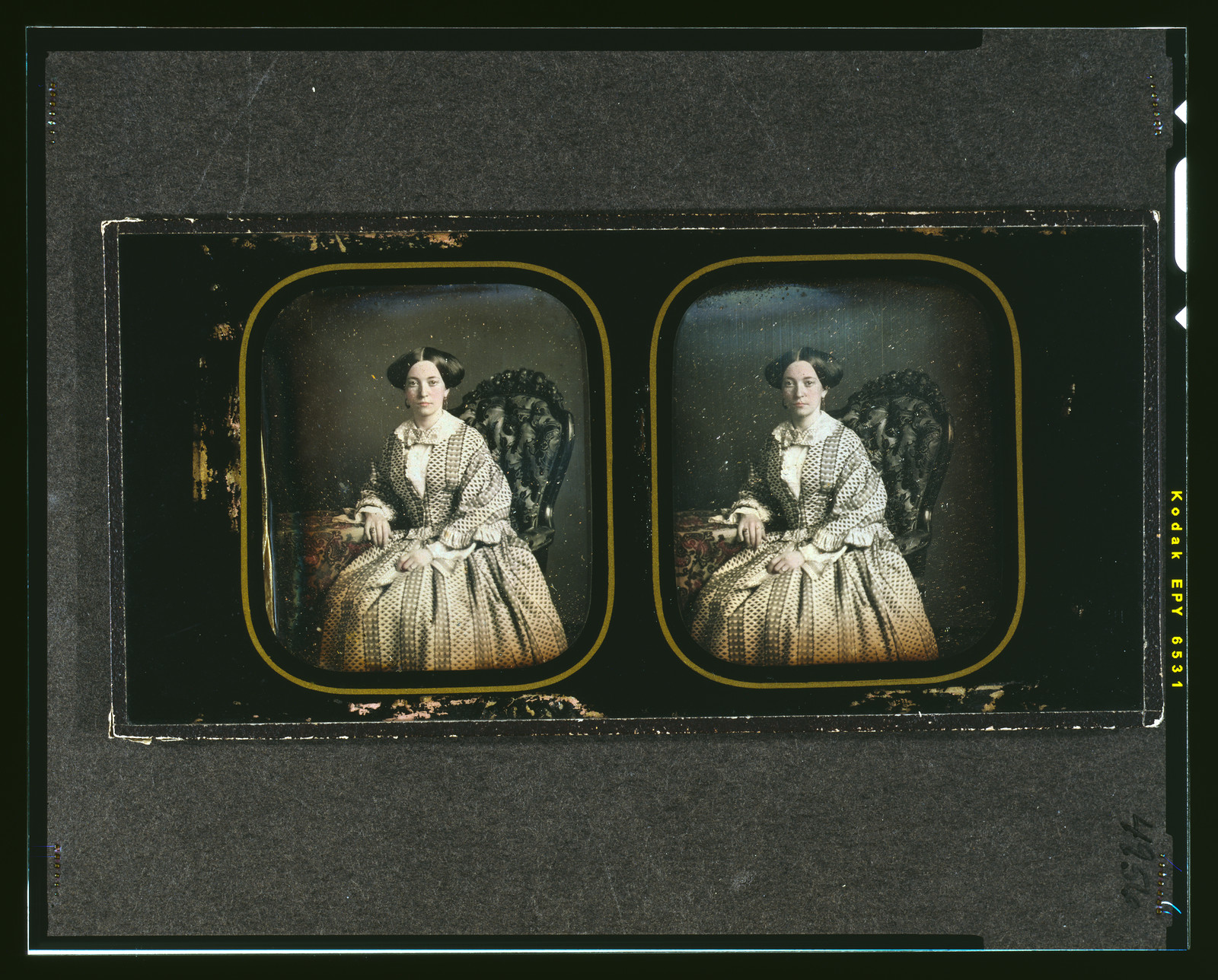[Henrietta, wife of Wardale G. McAllister, three-quarters length, seated in ornate chair, with arm resting on table with tablecloth], 1855 May 18. — historic photograph