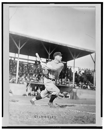 [Frank Gilhooley, baseball player with the New York Yankees, swings his bat at home plate]