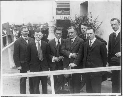 Carl Byoir, George Creel, James Keeley, William H. Rankin, Maurice Lyons and 2 unknown men posed at the United States government war exposition, Chicago, Ill.