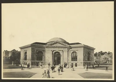 Domed stone library building with people in period dress