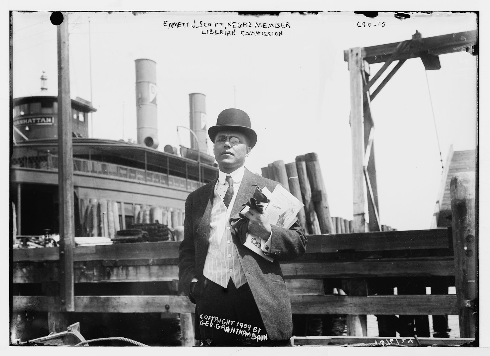 Emmett J. Scott, Negro member of Liberian Commission, at boat dock, New York, 1909 — historic photograph