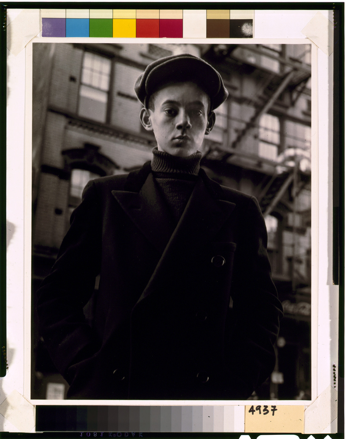 Boy in black coat, Pitt St., N.Y. — historic photograph