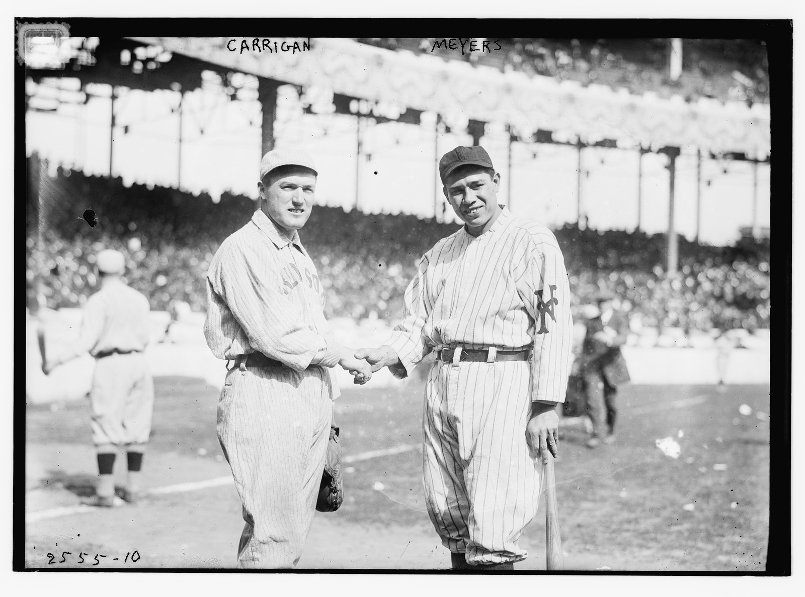 Bill Carrigan (Boston AL) & Chief Meyers (New York NL) during World Series at Polo Grounds, NY, 1912 (baseball), [1912] — historic photograph