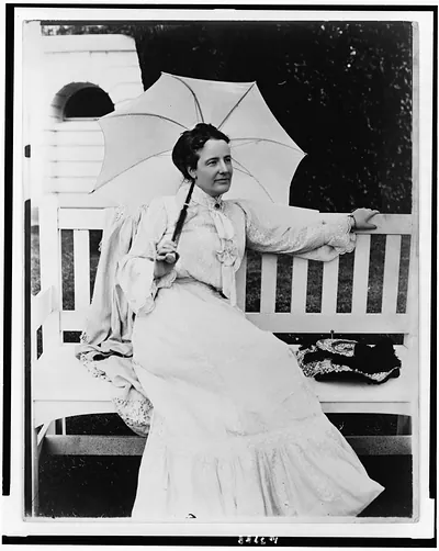 [Edith Kermit Carow Roosevelt, full-length portrait, seated on bench, facing right, holding umbrella]