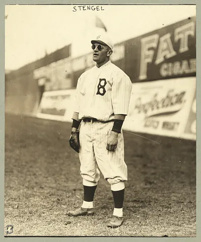 [Casey Stengel, full-length portrait, standing, facing left, wearing sunglasses, while playing outfield for the Brooklyn Dodgers]