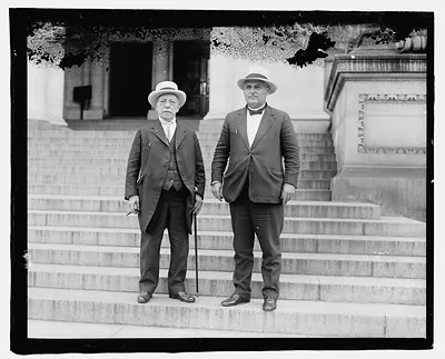 Janie Gompers and Mr. Morrison. One figure holding cane at side