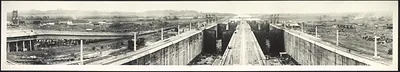 Panoramic view of canal locks with concrete walls and gates