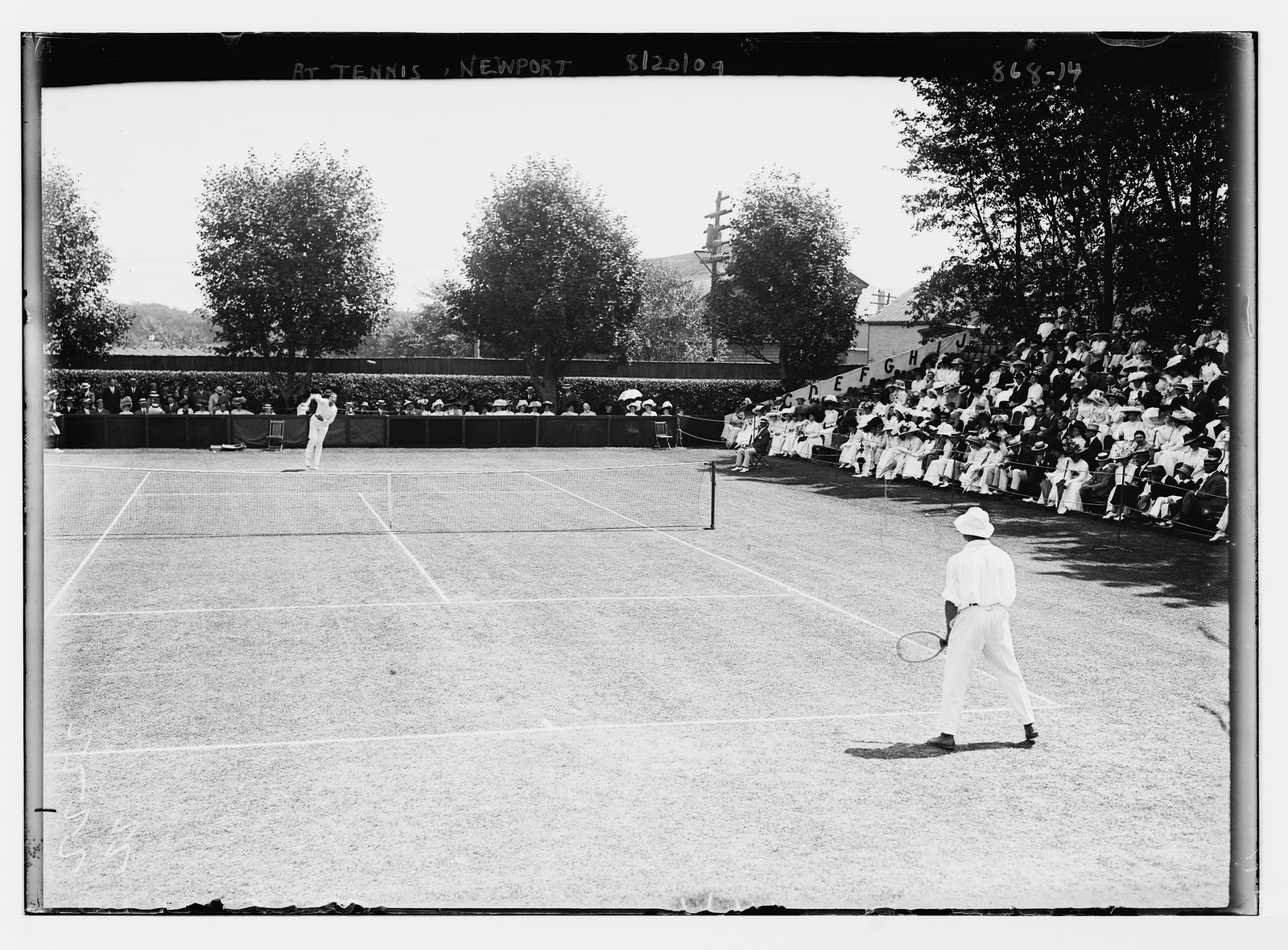 Tennis players on court, Casino, Newport, 8/20/09. — historic photograph