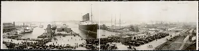 Panoramic photograph of an ocean liner at a New York pier