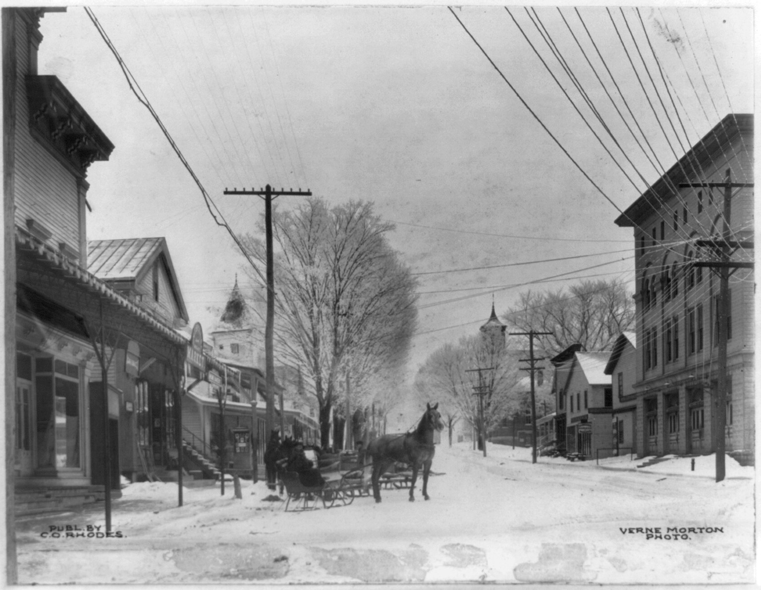 Horses and sleighs on snow covered Cortland Street, looking east, Groton, N.Y. — historic photograph