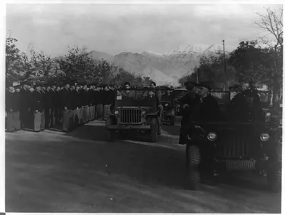 President Franklin D. Roosevelt, Commander-in-Chief of the U.S. Army and Navy, reviews officers of the Persian Gulf Command at Camp Amirabad