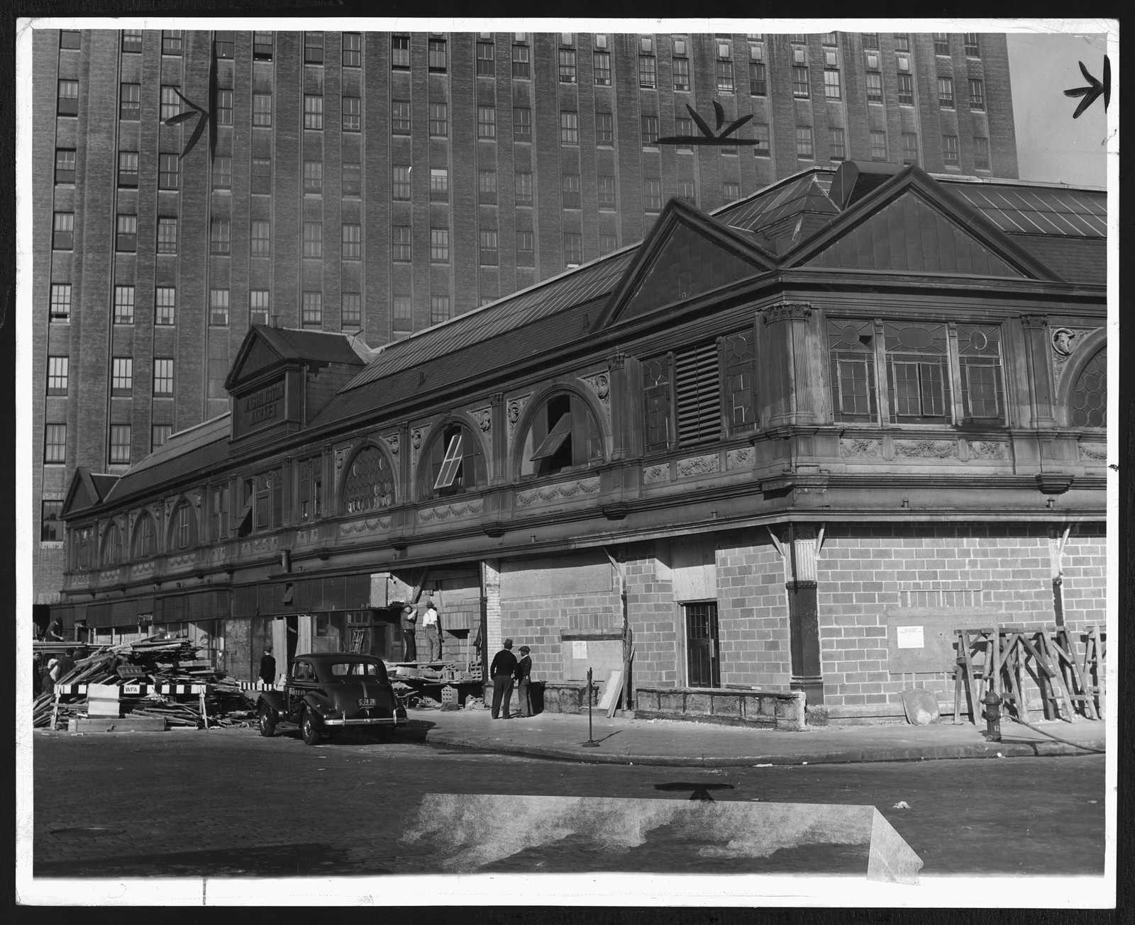 Renovation work on a historic market building with debris — historic image