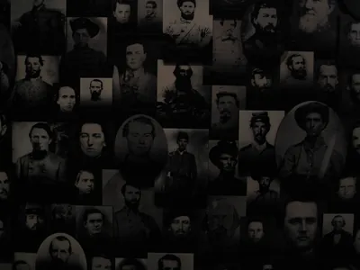 Wall of 19th-century soldier portrait photographs