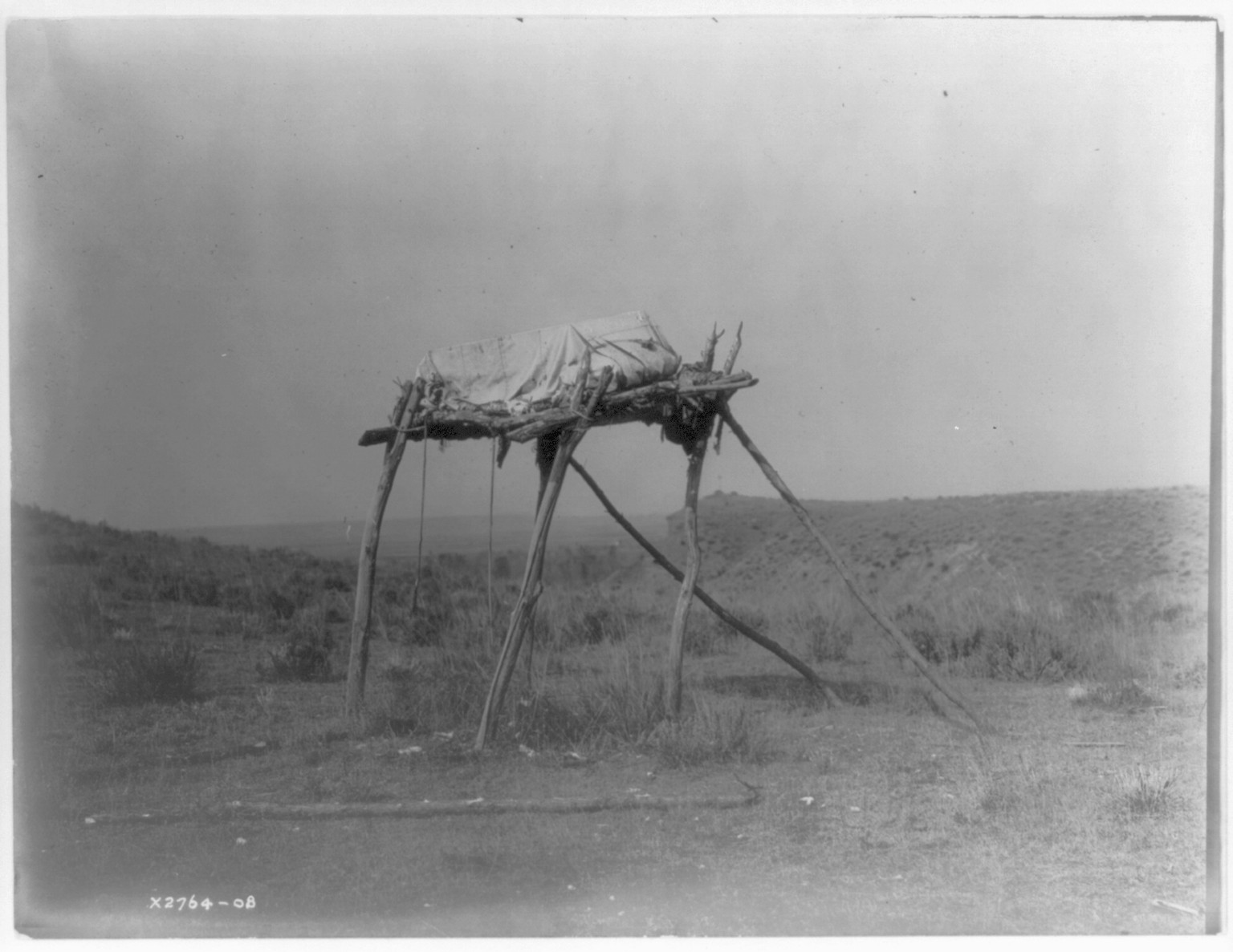 A burial platform--Apsaroke, c1908 July 6. — historic photograph