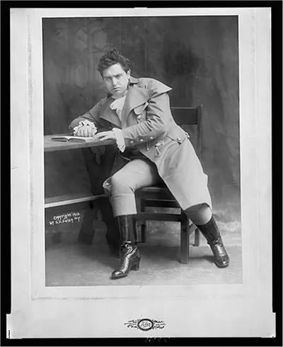 [John McCormack, full-length portrait, seated, facing front, dressed in costume] / Foley, New York.