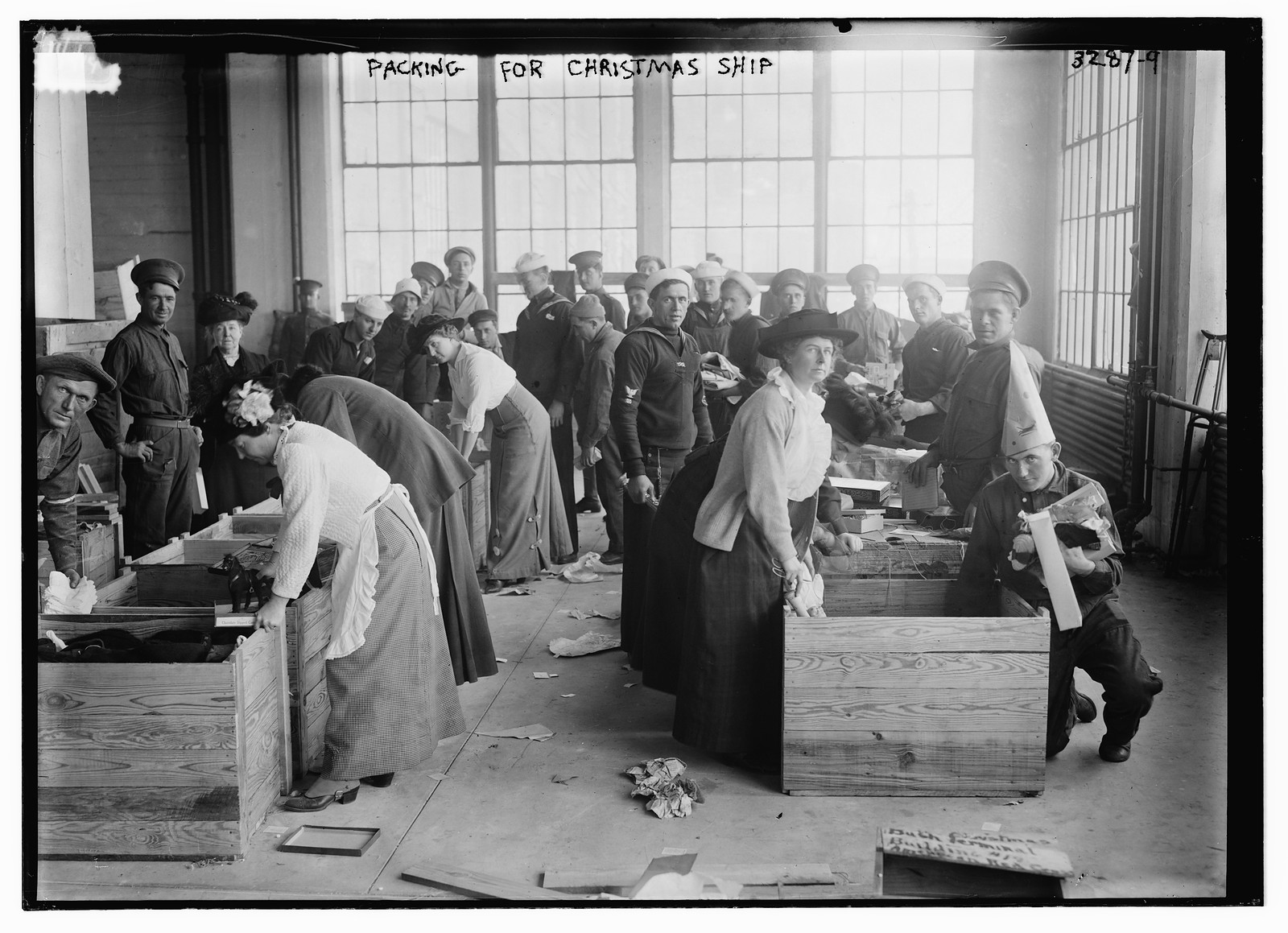 Packing for Christmas Ship, n/a — historic photograph