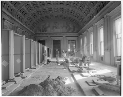 [Library of Congress interiors, 1958: South Gallery, 2nd floor; marble floor after repair; work beginning]