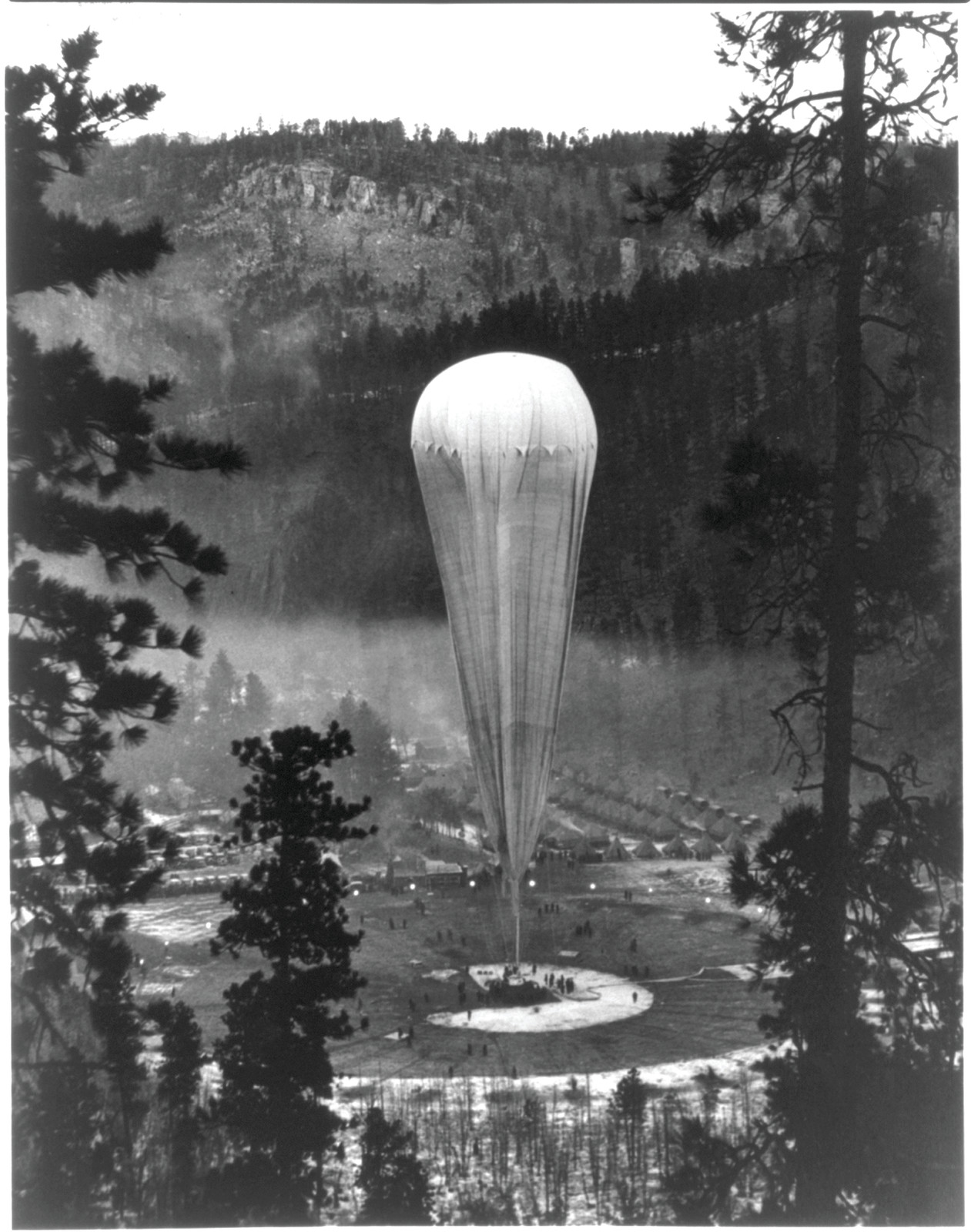 [Explorer II on the floor of the Stratobowl near Rapid City, South Dakota, 5 mins. before the ascent to the stratosphere by Capt. Albert Stevens and Capt. Orvil Anderson for the world altitude record], 1935 Nov. 11. — historic photograph