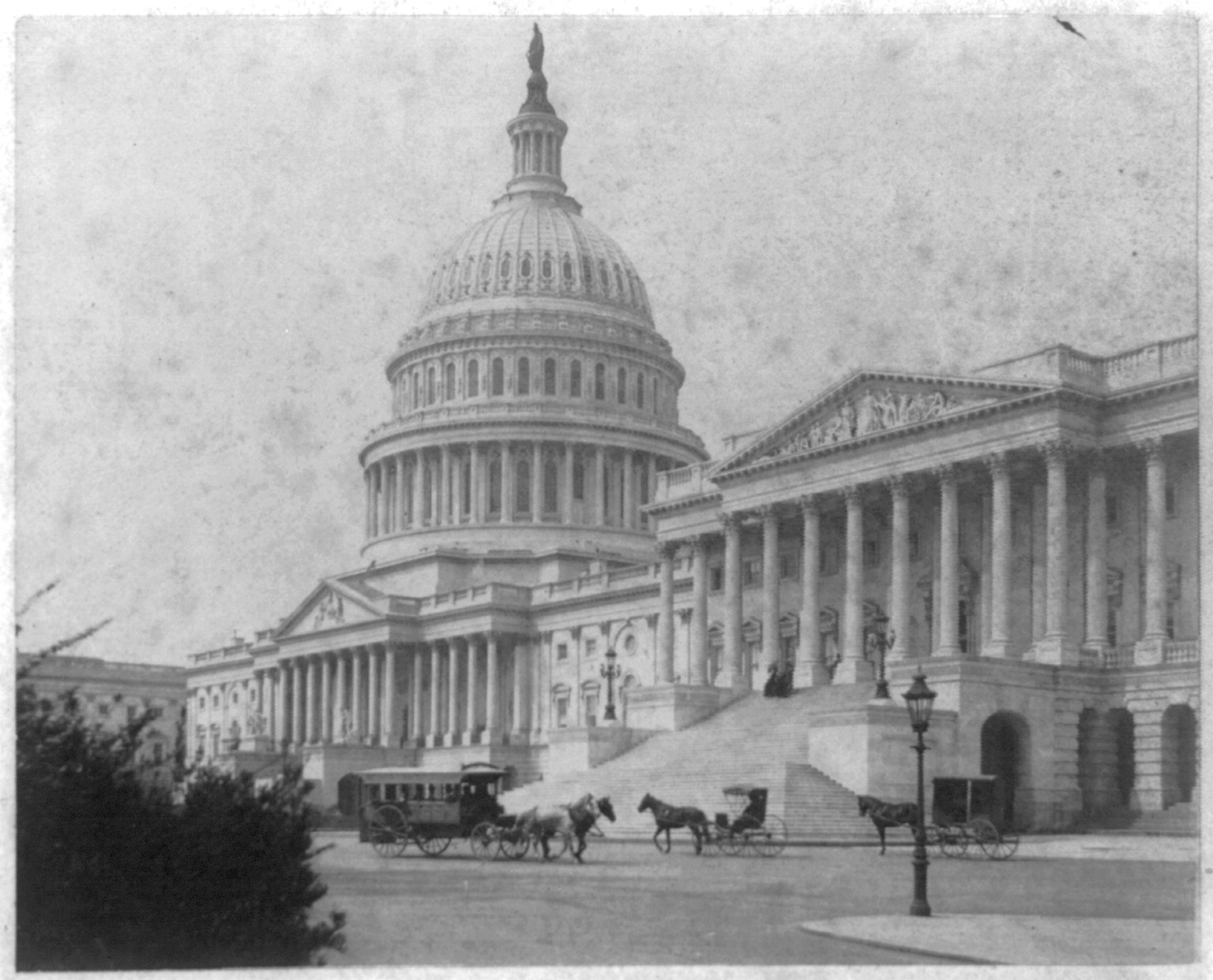 [U.S. Capitol, Washington, D.C. East Front from N.E., with horses and carriages in front] — historic photograph
