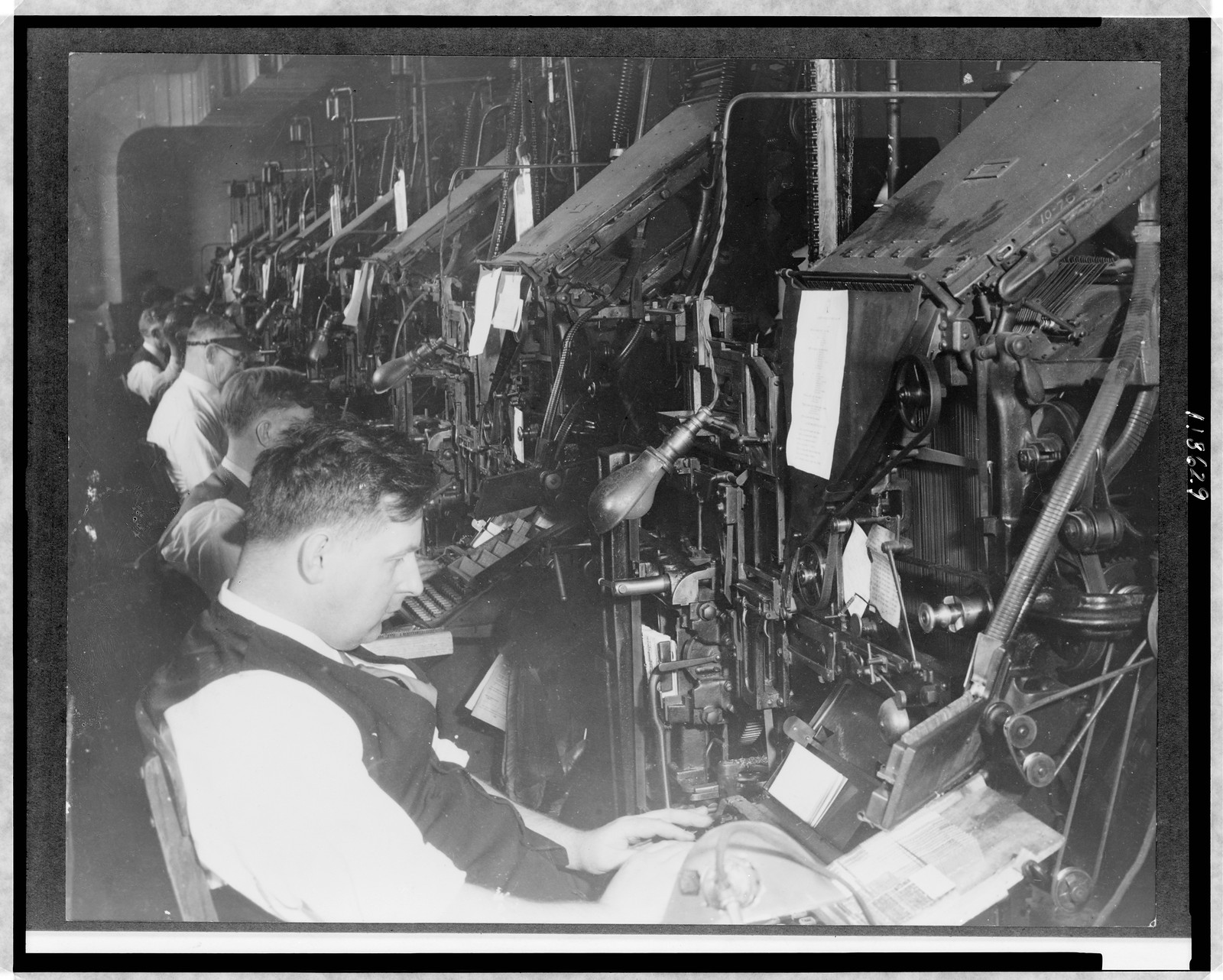 [Men working at machines in Card Division Printing Office, Library of Congress, Washington, D.C.], [between 1900 and 1920] — historic photograph