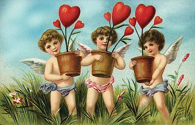 Vintage Valentine card with three cherubs holding heart plants