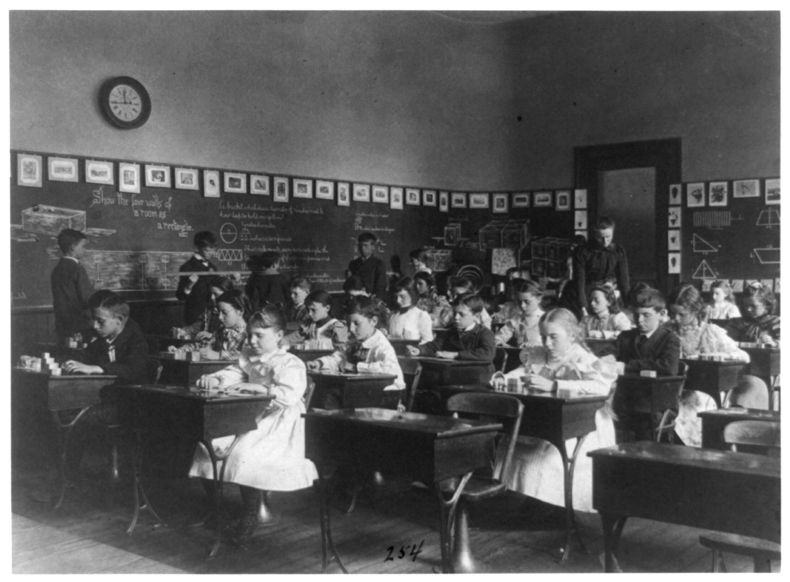 [Children in school in Washington, D.C. - studying geometry], [1899?] — historic photograph