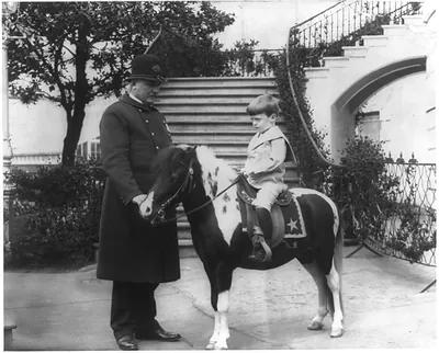 Quentin Roosevelt instructed in horsemanship at the White House