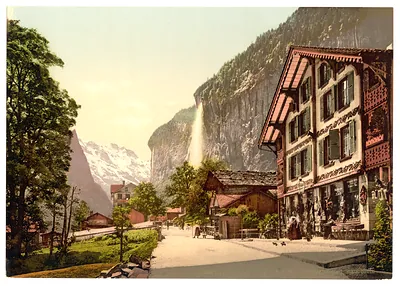 Lauterbrunnen Valley street view with Staubbach Waterfall Bernese Oberland Switzerland