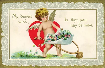 Valentine card with cupid pushing a wheelbarrow of flowers