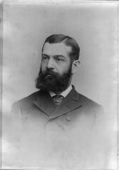 [William Dutcher, head-and-shoulders portrait, facing left]