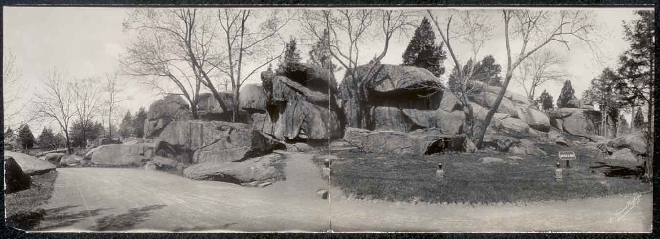 Large boulders and bare trees beside a road, Devil's Den — historic image