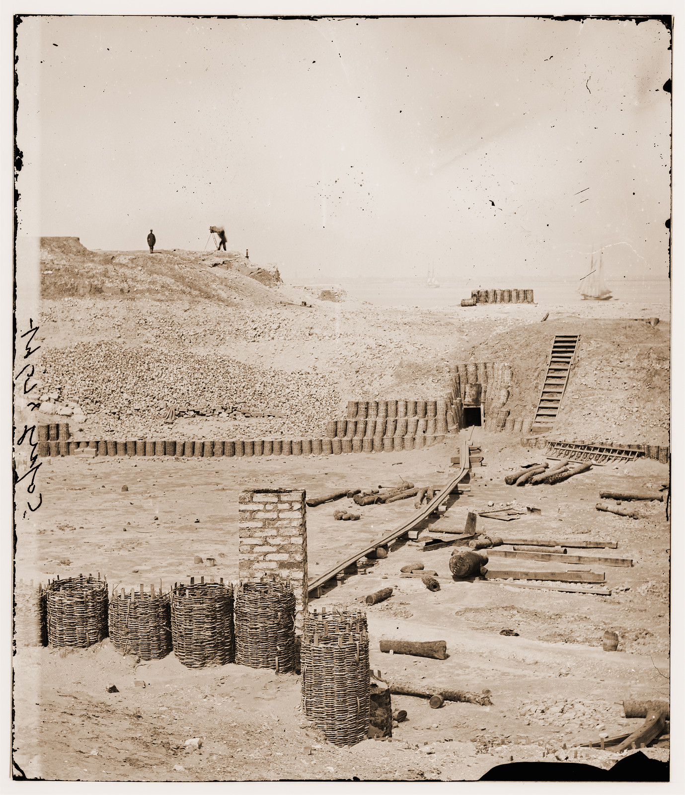 Charleston South Carolina. Photographer Samuel Cooley on parapet of Fort Sumter pho, 1865 — historic photograph