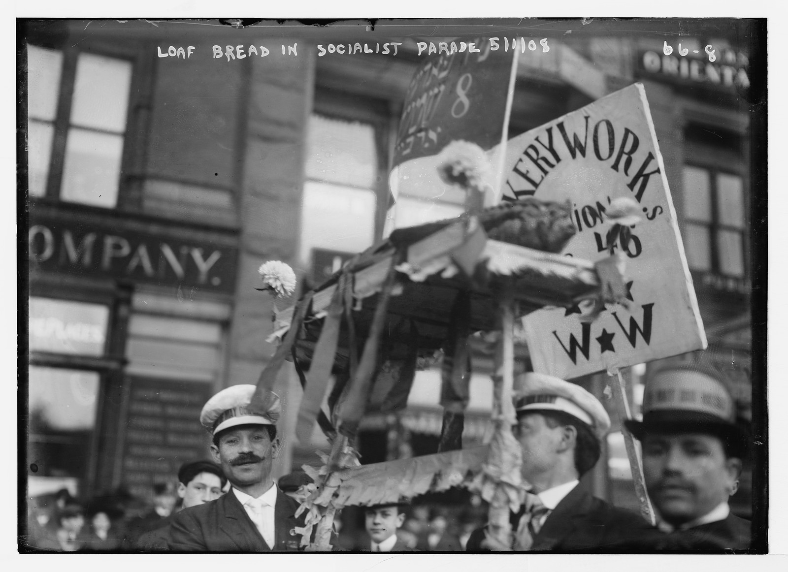Loaf of bread float carried in Socialist Parade, New York, 5/1/08. — historic photograph