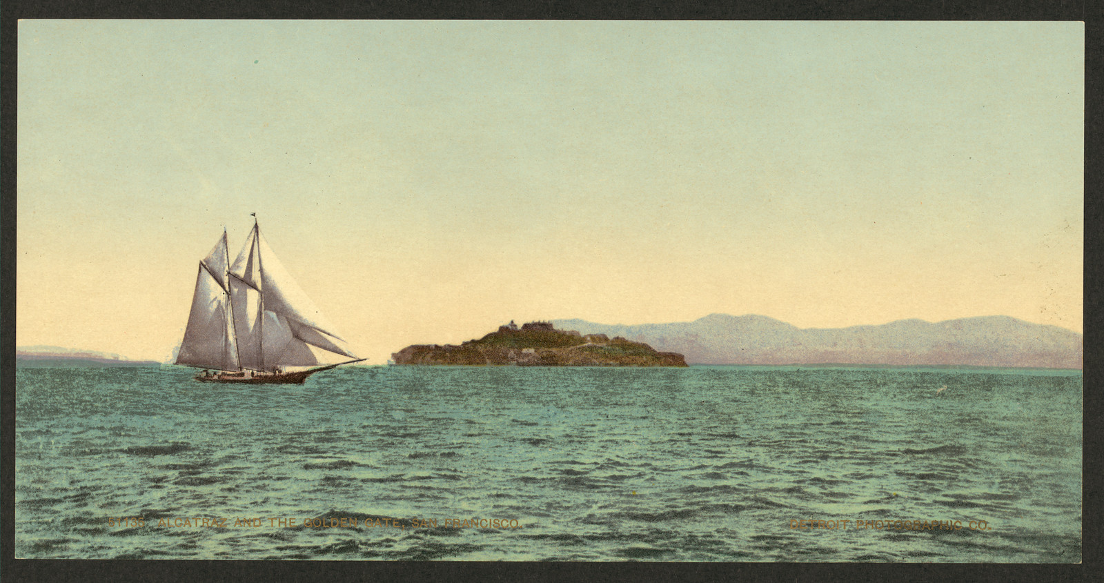 Schooner sailing past an island, hand-colored print — historic print