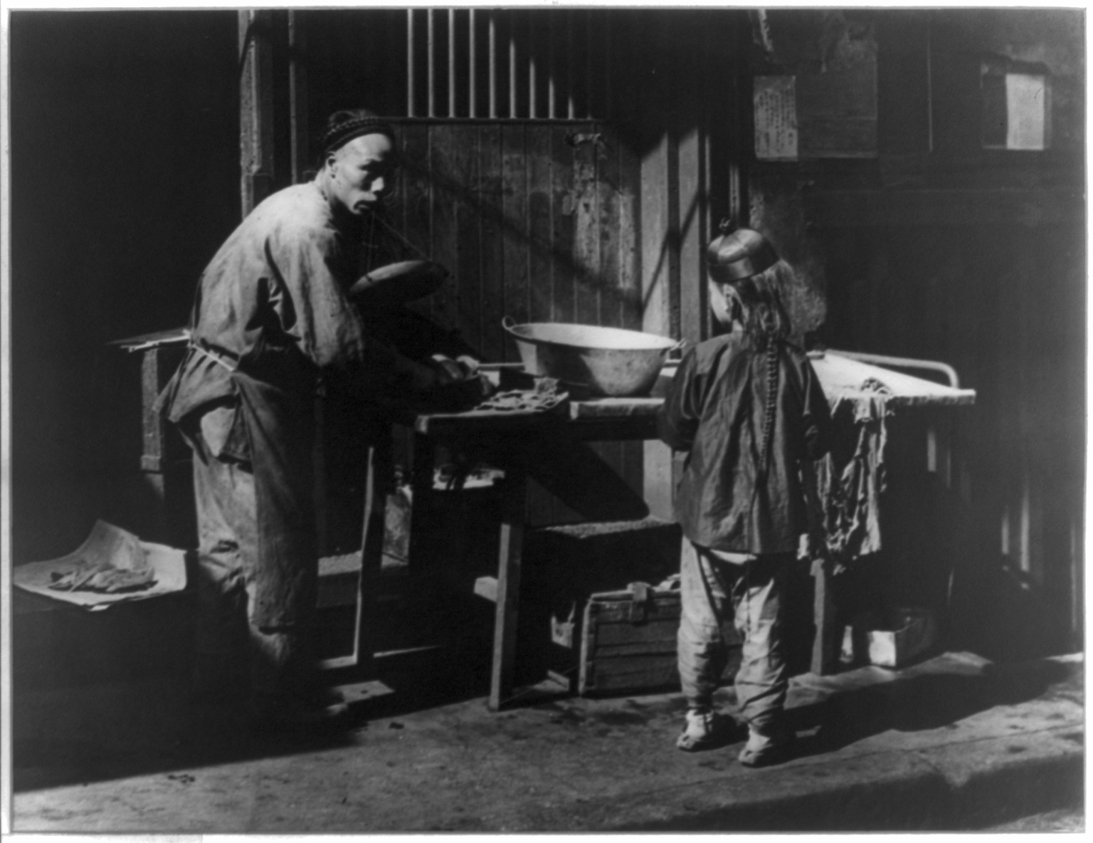[Chinese in Chinatown, San Francisco]: The butcher, [no date recorded on caption card] — historic photograph