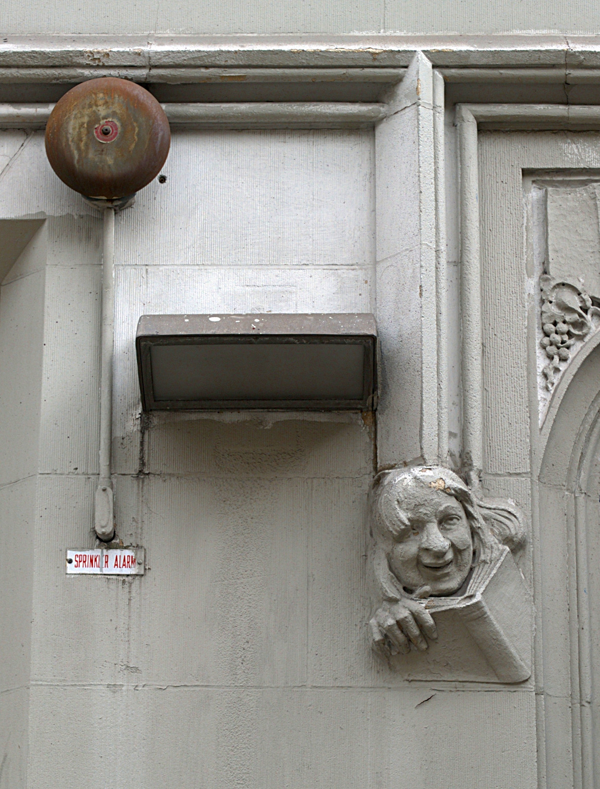 Happy Reader Mascaron A Sprinkler Alarm & Monocled Reader Mascaron, New York, NY — historic image