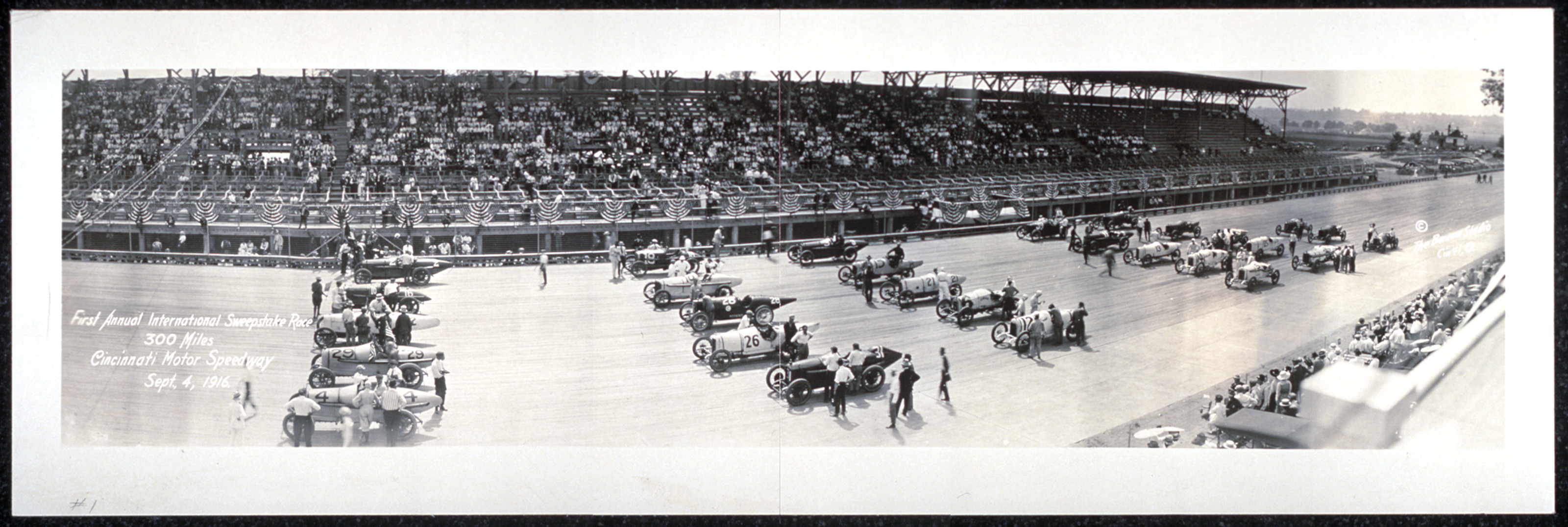Race cars at Cincinnati Motor Speedway grandstand panorama, 1916 — historic image