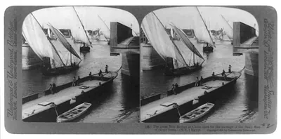 The great Nile Bridge at Cairo open for the passage of the daily fleet of cargo boats--(N.E.) Egypt