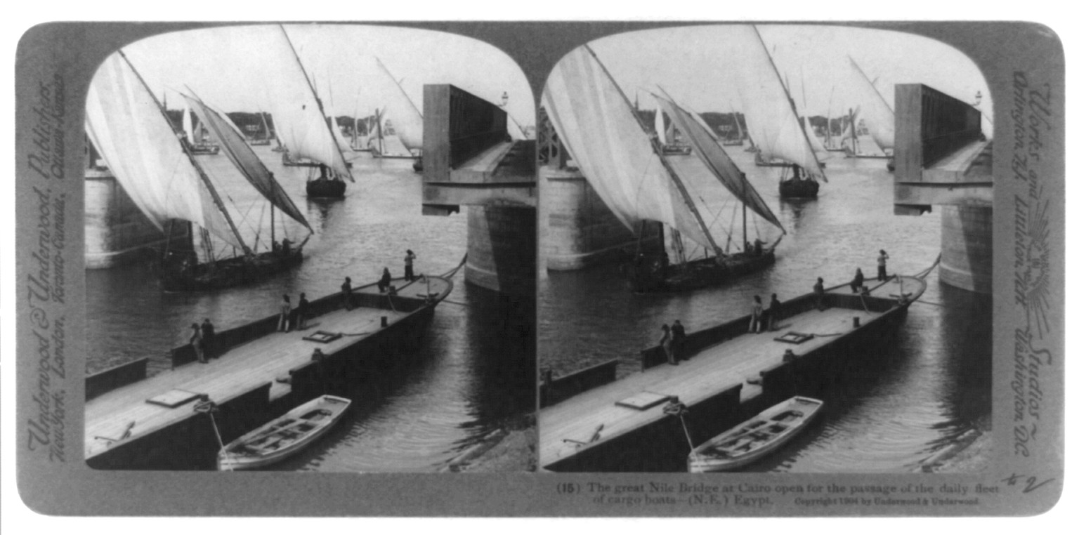 The great Nile Bridge at Cairo open for the passage of the daily fleet of cargo boats--(N.E.) Egypt, New York : Underwood & Underwood, publishers, c1904. — historic photograph
