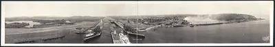 Panoramic view of Gatun Locks with ships and lake