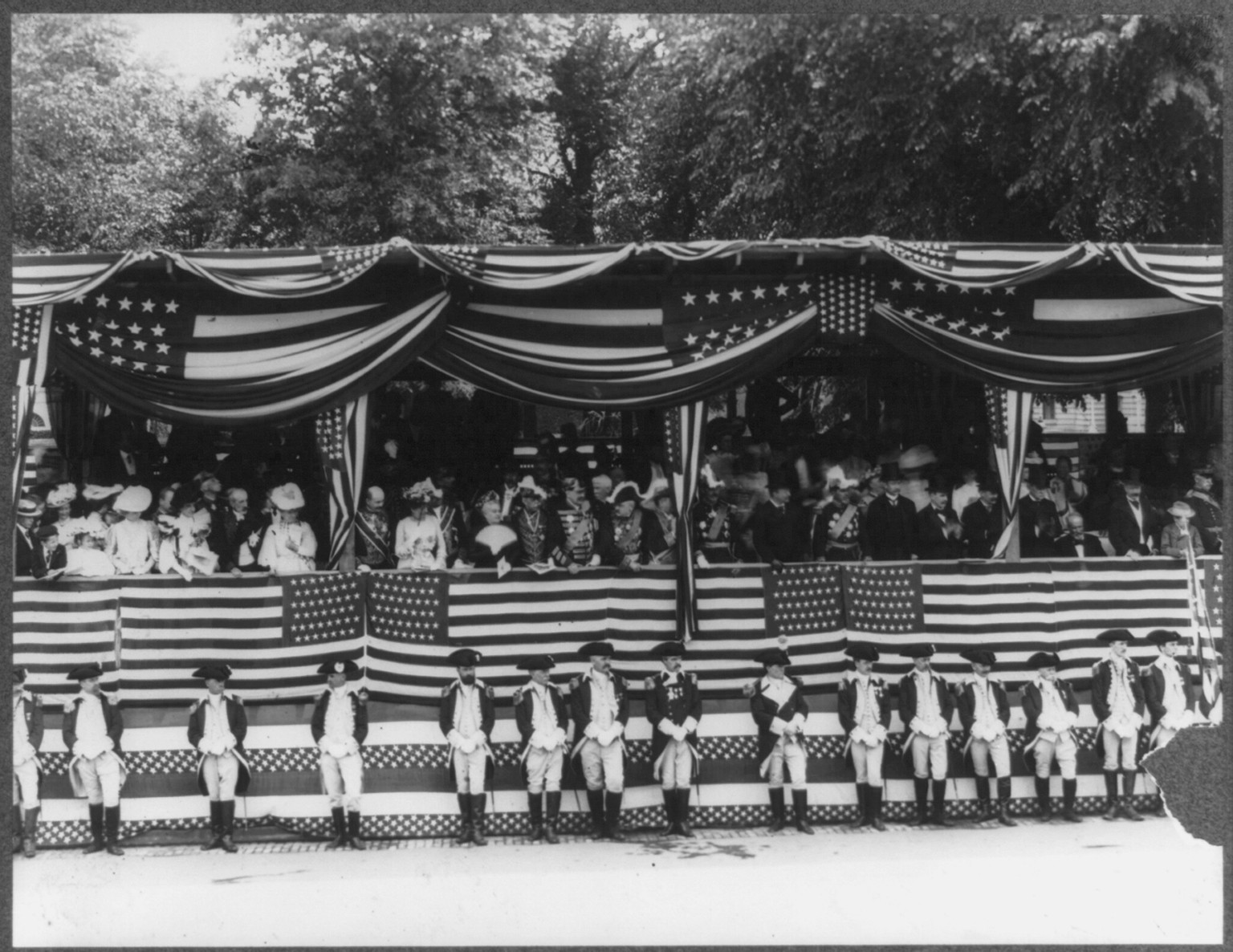 [Theodore Roosevelt, Pres. U.S., half-length, standing in reviewing stand, facing right, Rochambeau ceremonies for unveiling of Rochambeau statue by J.J. Fernand Hamar in Lafayette Square, Wash., D.C.] — historic photograph