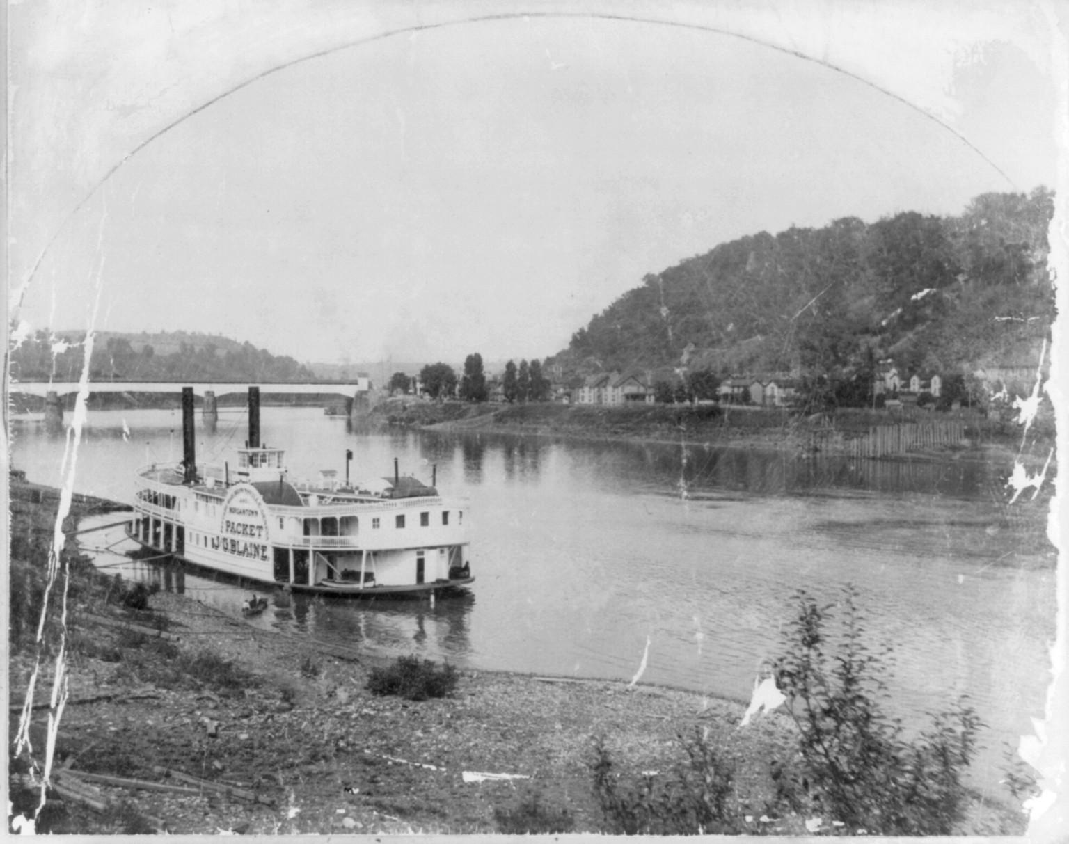 [Steamboat J.G. PLAINE in front of the Monongahela Bridge, Brownsville, Pa.] — historic photograph