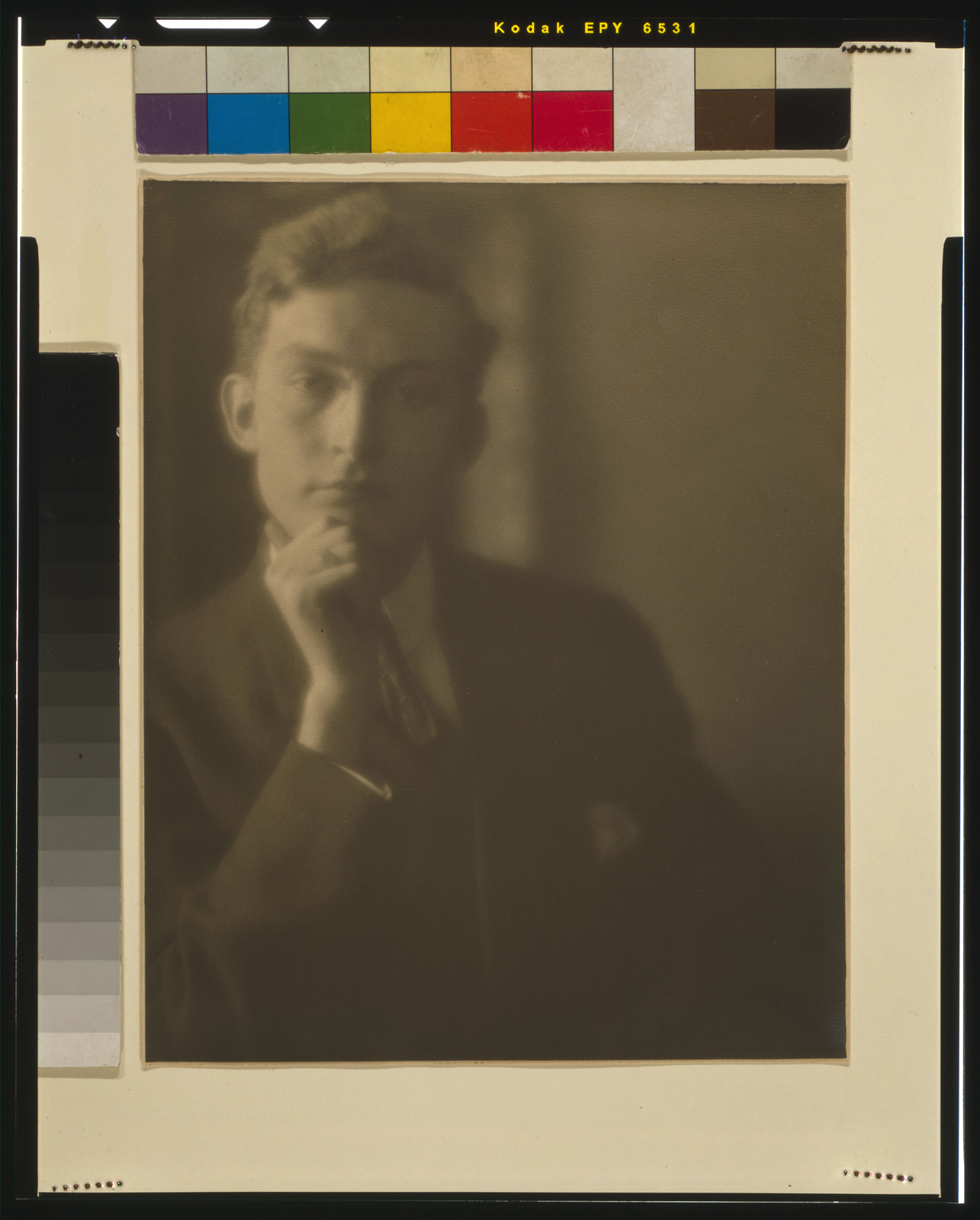 [Man, in suit, with hand on chin], [1906?] — historic photograph