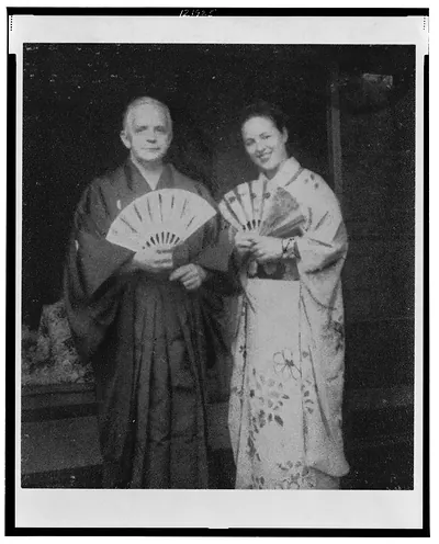 [Christmas card with three-quarter length portrait of Walter and Poppy Cannon White, in Tokyo, wearing Japanese kimonos]