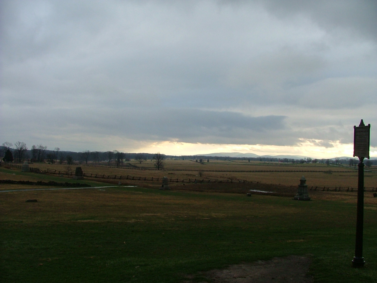 Overcast Battlefield Fields with Fences, Monuments and Interpretive Sign — historic image